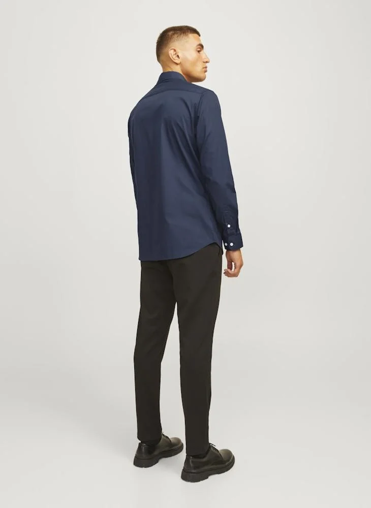 ج ج ريبل قميص بأكمام طويلة بقصة ضيقة بلون سادة