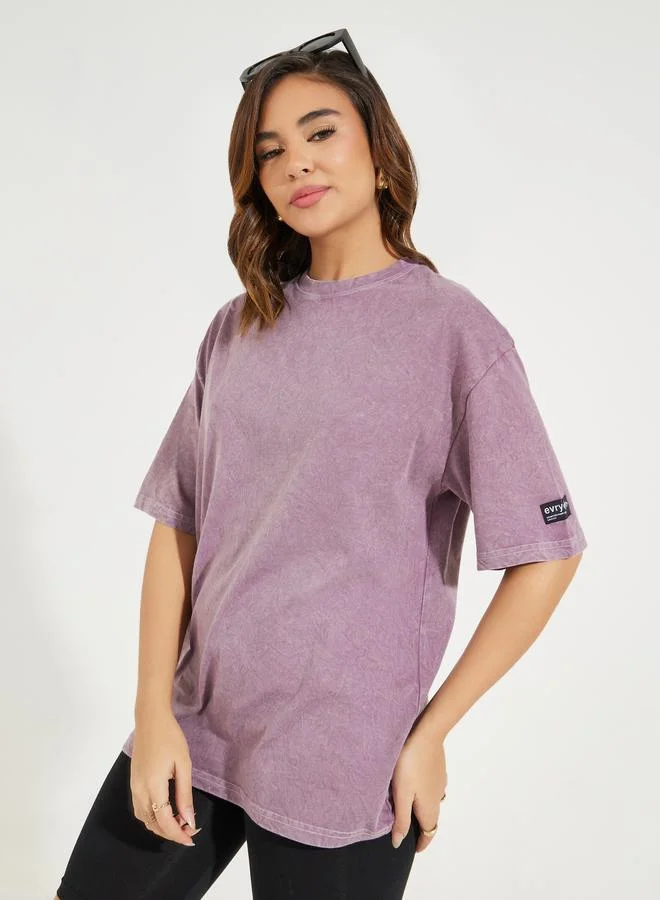 Styli Oversized Longline Acid Wash T-Shirt with Badge Detail