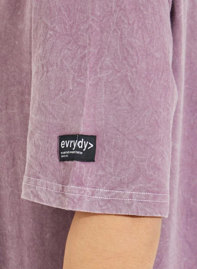 Styli Oversized Longline Acid Wash T-Shirt with Badge Detail