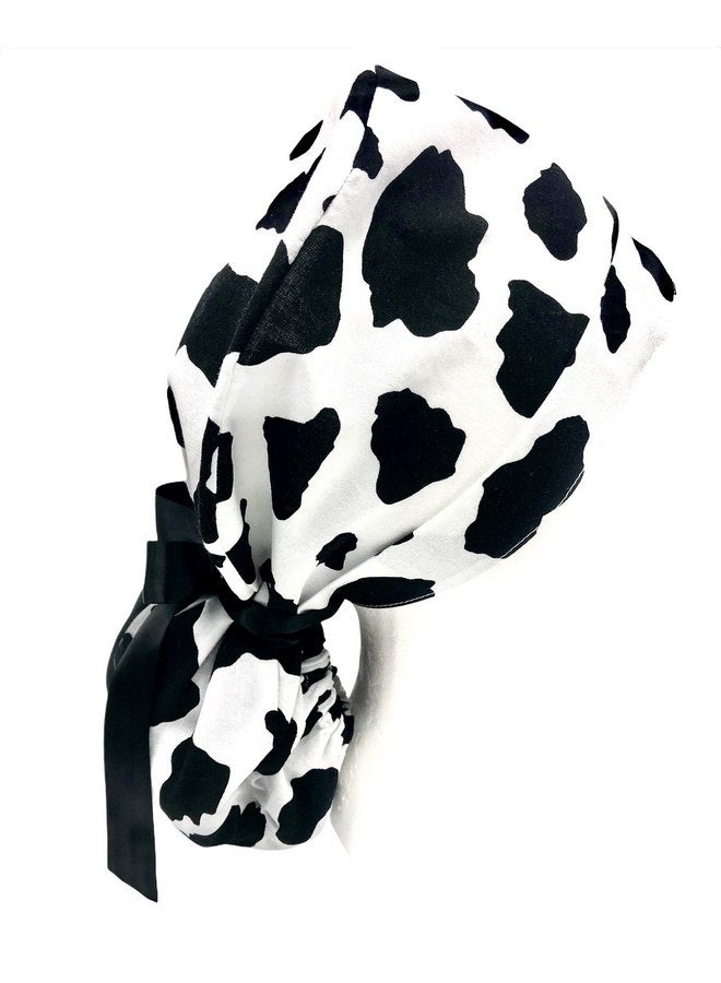 Generic Ponytail Scrub Cap, in a dramatic black and white cow pattern. Select the satin ribbon tie backs from 8 color options. - Image 5