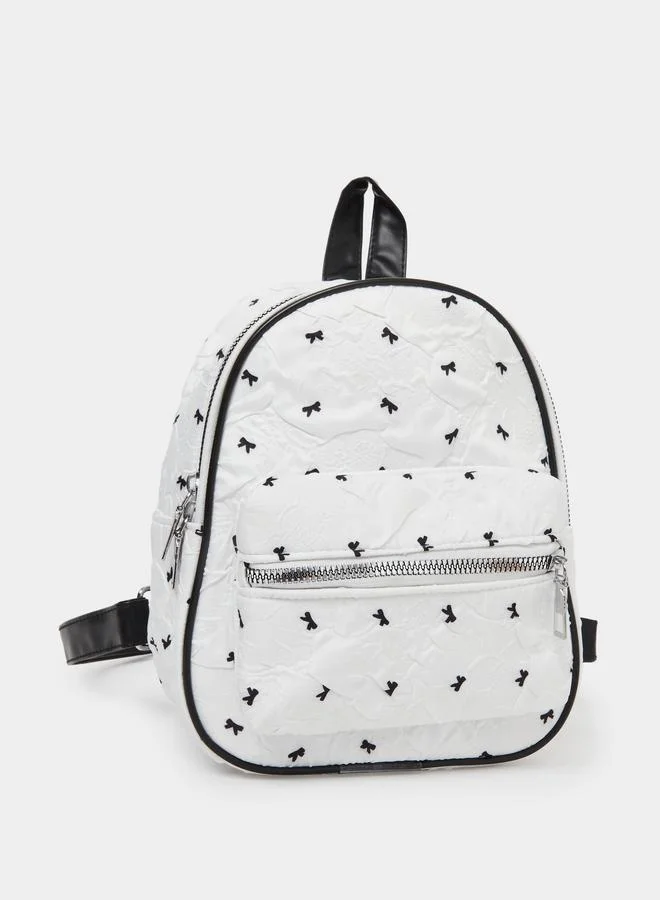 ستايلي شنطة ظهر صغيرة بيضاء بطبعة فيونكة وسحاب