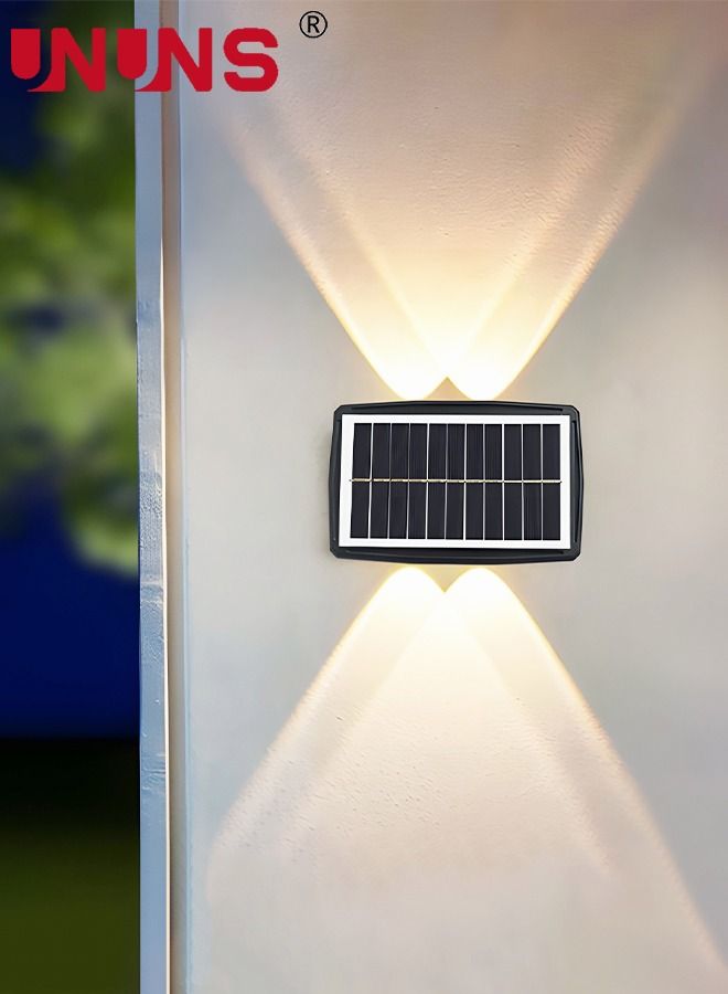 UNUNS LED Wall Light,Waterproof Solar Powered Lights With 4 LEDs And 2 Modes,Solar Fence Up Down Lamps For Garden Yard Decor,Warm White - Image 1