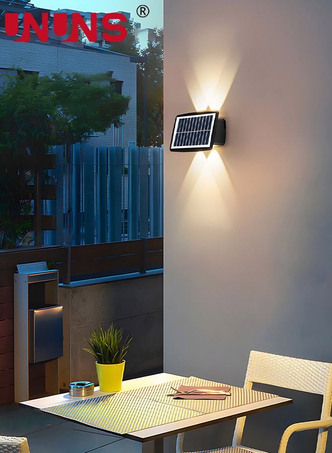 UNUNS LED Wall Light,Waterproof Solar Powered Lights With 4 LEDs And 2 Modes,Solar Fence Up Down Lamps For Garden Yard Decor,Warm White - Image 4