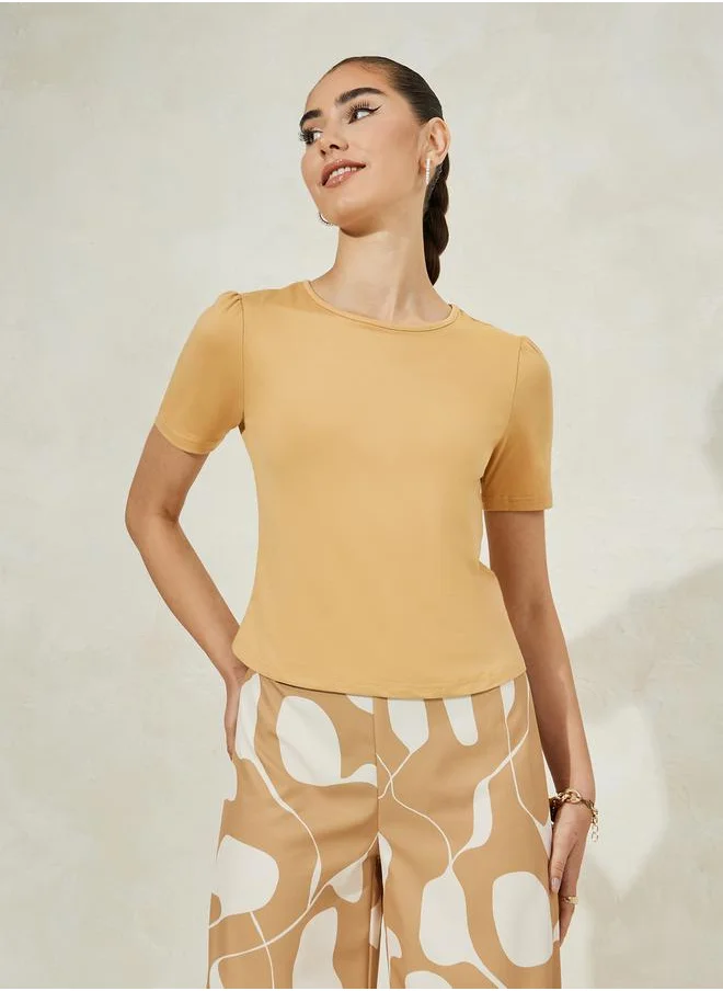 Styli Solid Knit Top & Printed Flared Pants Co-Ords