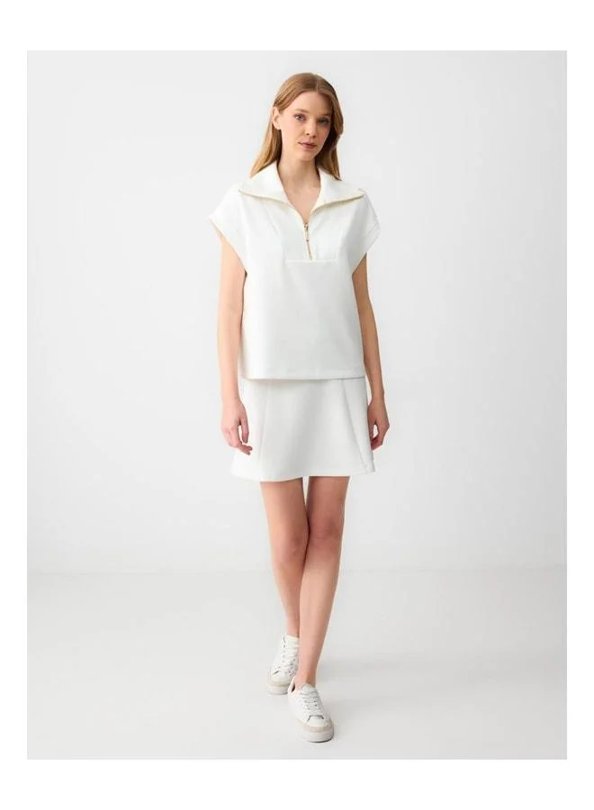 Jimmy Key White relaxed fit zip-front fisherman collar sleeveless knit sweatshirt.