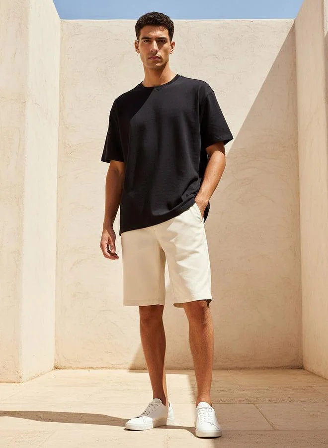 Lee Cooper BLACK Lee Cooper Men Regular Fit Crew Neck Short Sleeve Embroidered T-shirt for Men | Best Price UAE