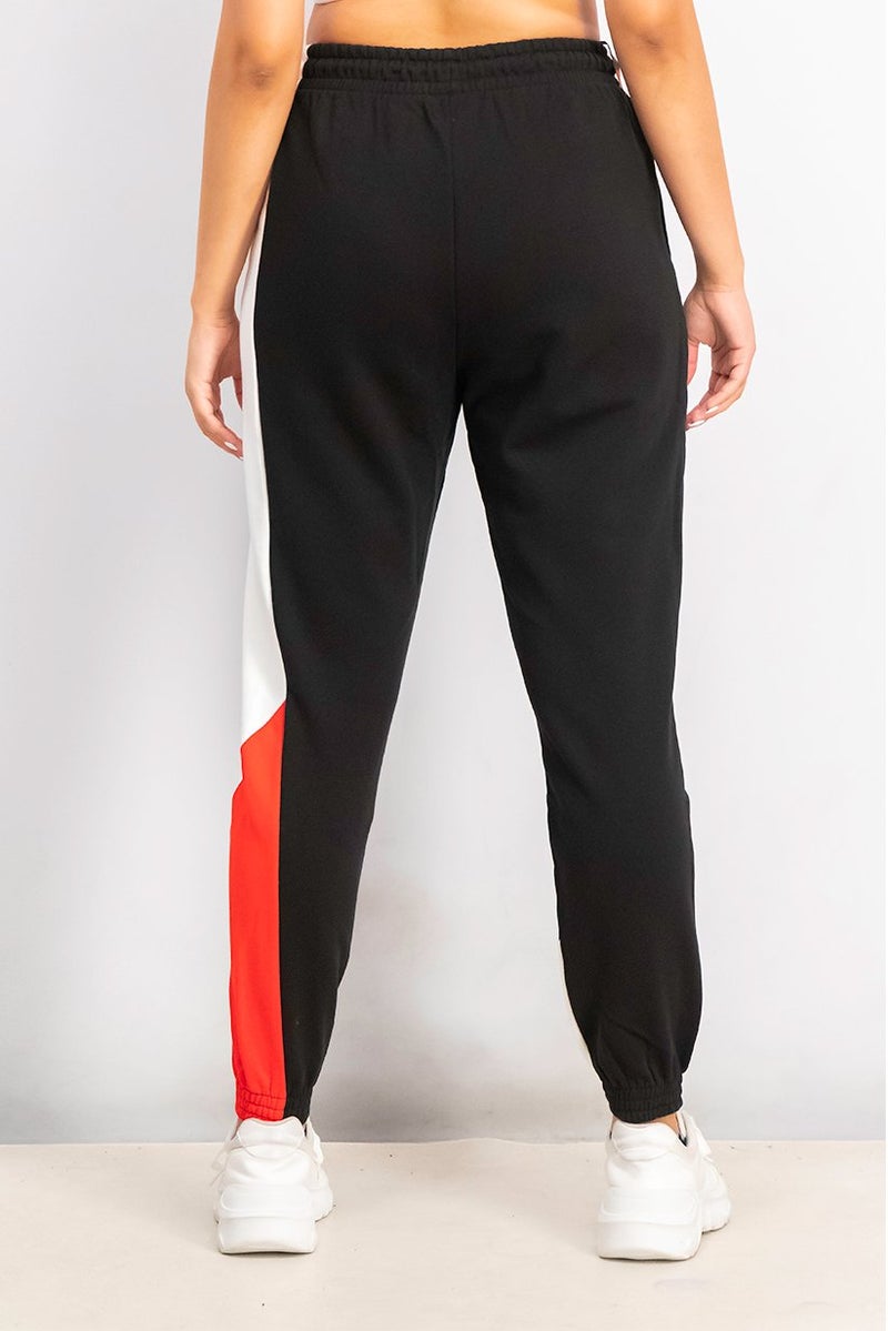 PUMA سروال تدريب عادي للنساء، أسود وأبيض - Image 2