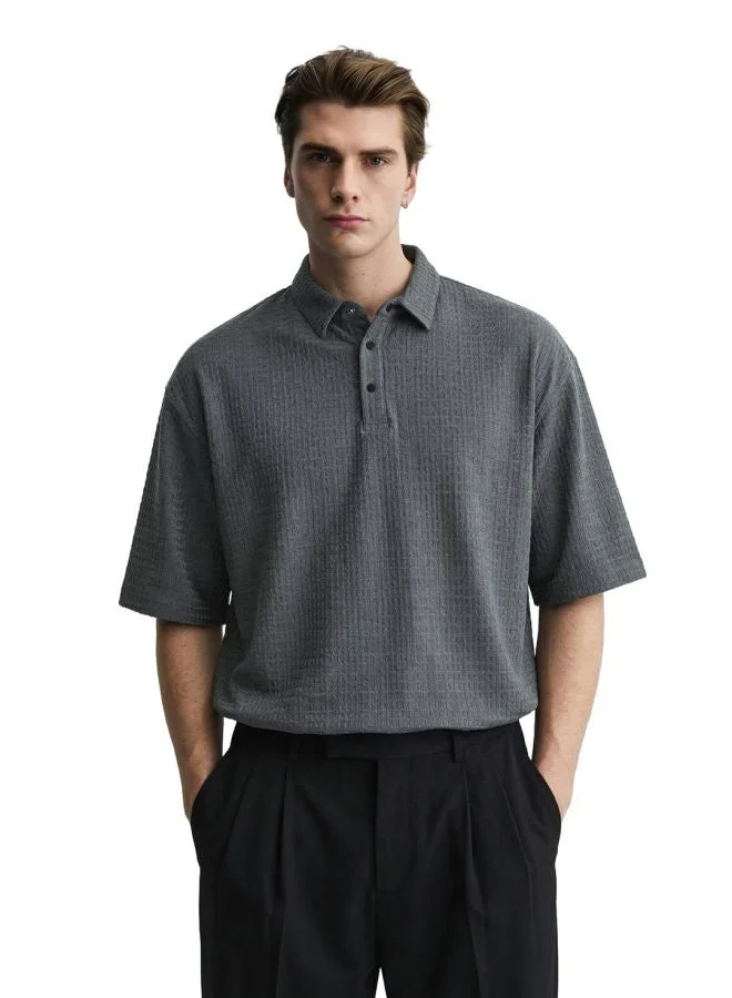 ذا انديان كراج كو Men Boxy Fit Textured Round Neck Half Sleeves Polo T-Shirt