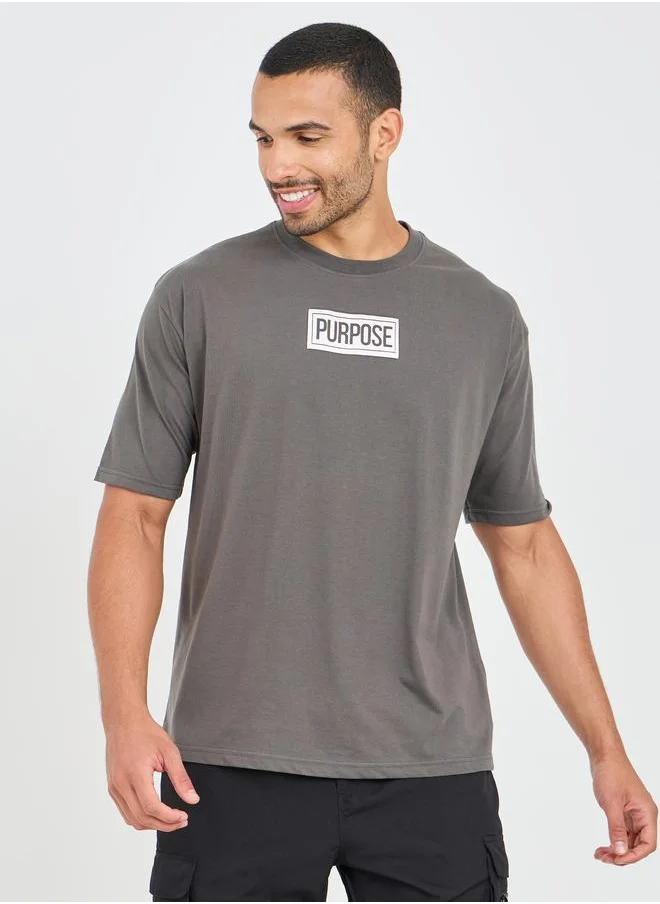 Styli Styli Oversized Slogan Print Detail T-Shirt