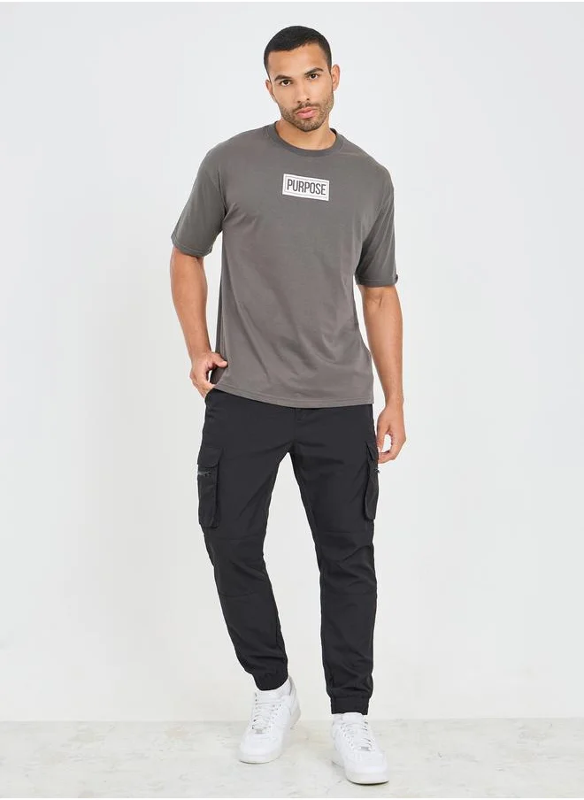 Styli Styli Oversized Slogan Print Detail T-Shirt