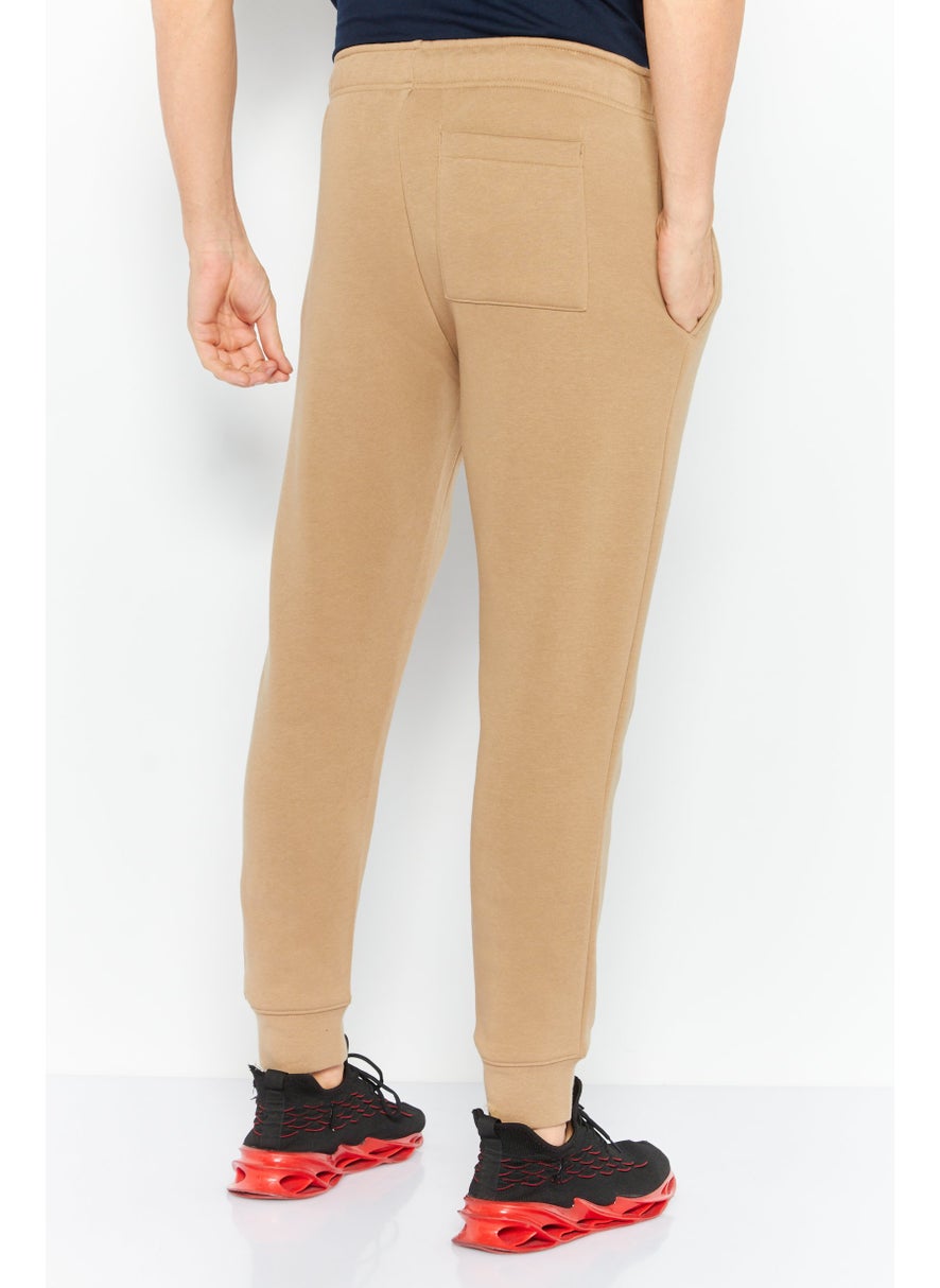 DKNY Sport Men Sportswear Fit Brand Logo Outdoor Sweatpants, Tan  - Image 4