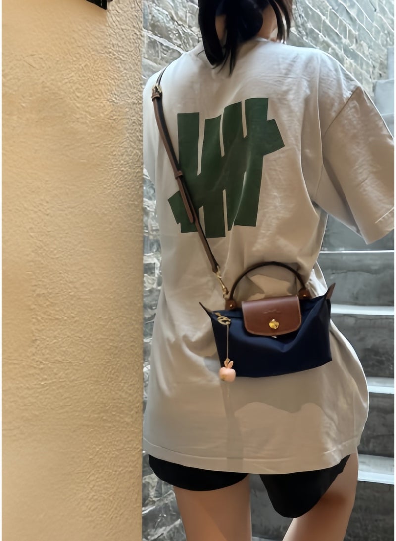 لونج شامب حقيبة صغيرة نسائية Longchamp Le Pliage بحمالة كتف قابلة للطي، حقيبة مكياج صغيرة متعددة الاستخدامات، حقيبة يد، حقيبة كتف كلاسيكية وأنيقة. - Image 4