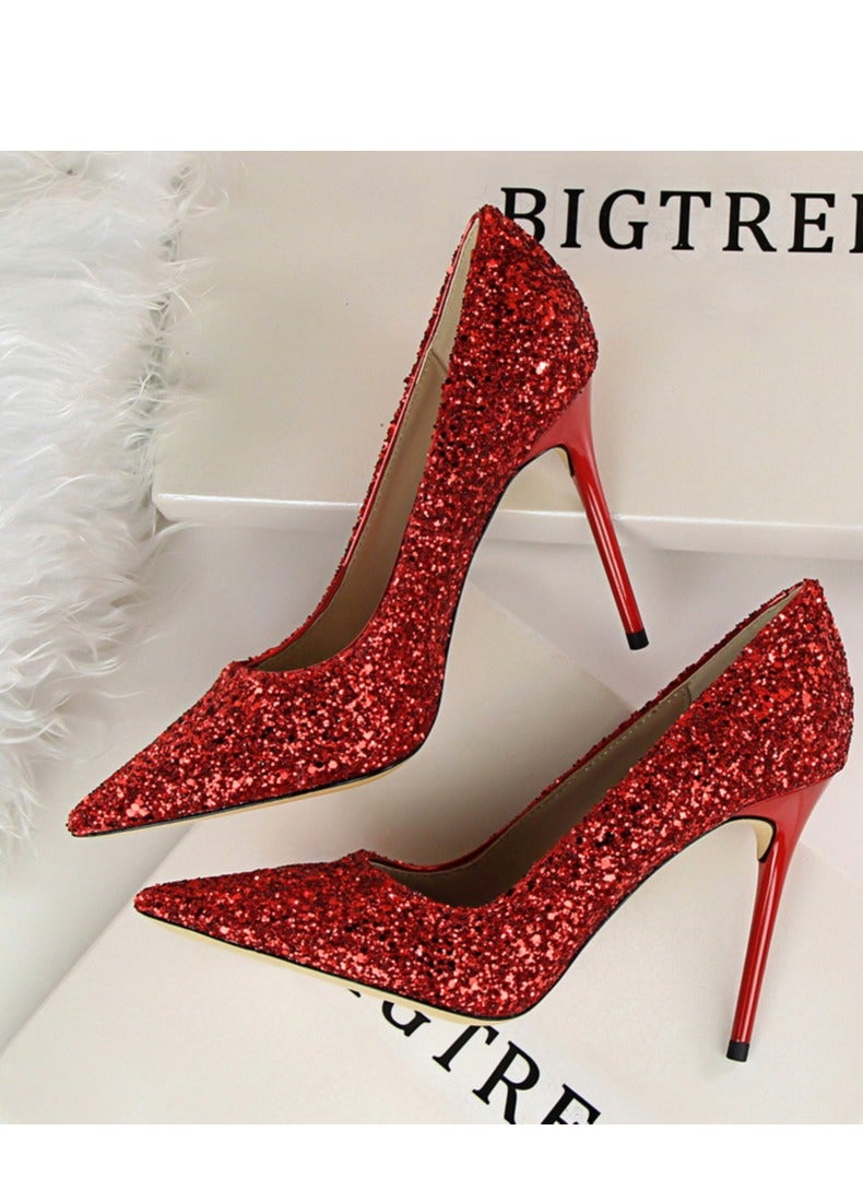 BIGTREE حذاء نسائي بكعب رفيع لامع مدبب ذو فم ضحل على الطراز الأوروبي بطول 10 سم باللون الأحمر - Image 1