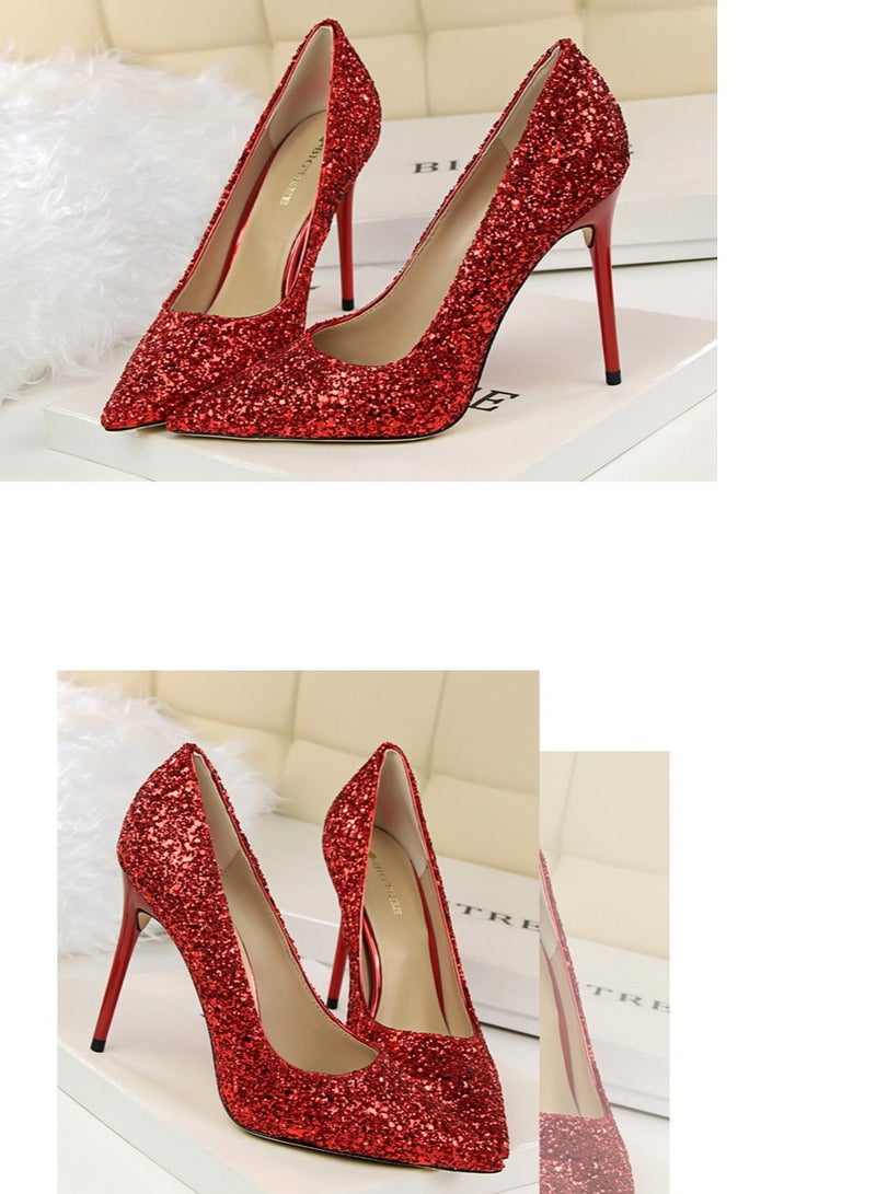 BIGTREE حذاء نسائي بكعب رفيع لامع مدبب ذو فم ضحل على الطراز الأوروبي بطول 10 سم باللون الأحمر - Image 2