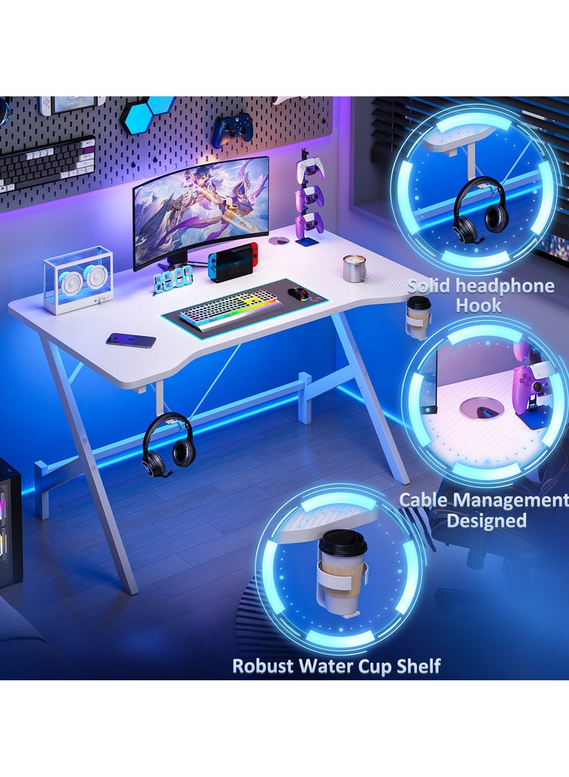 FAMAPY Gaming Desk 110*54*74 cm,Gamer Table With Headphone Hook⋓ Stand,Gaming Desk with Carbon Fibre Surface,Double Cable Hole Writing Study Workstation or Kids Office Table,Ideas for Gamers and Students - Image 4