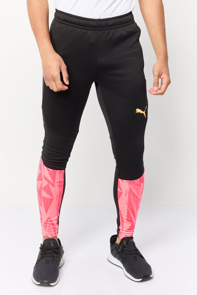 PUMA سروال تدريب ضيق للرجال، أسود - Image 1