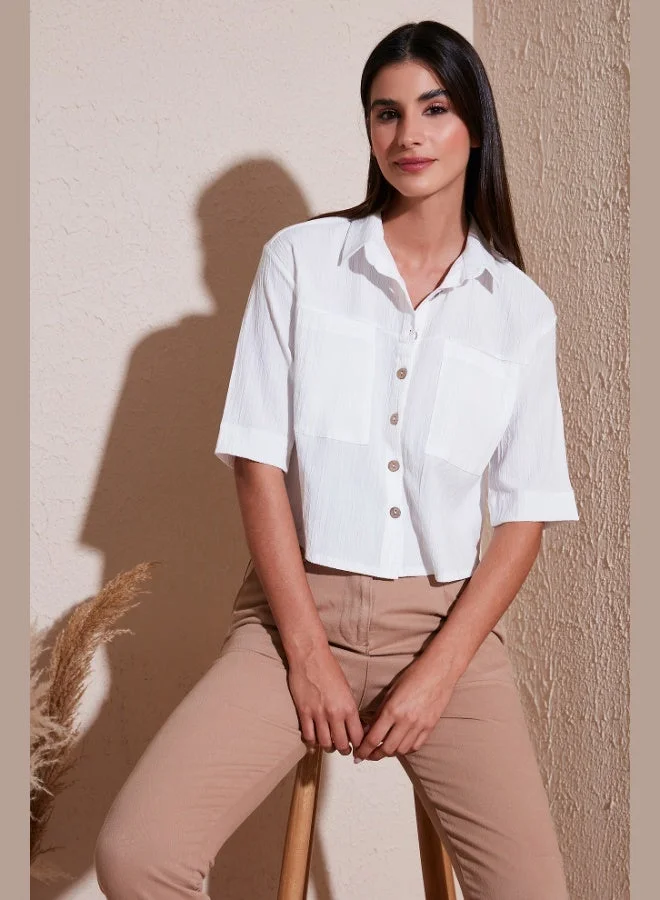 ليلا قميص نسائي بأكمام قصيرة وجيبين بقصة عادية ليلى