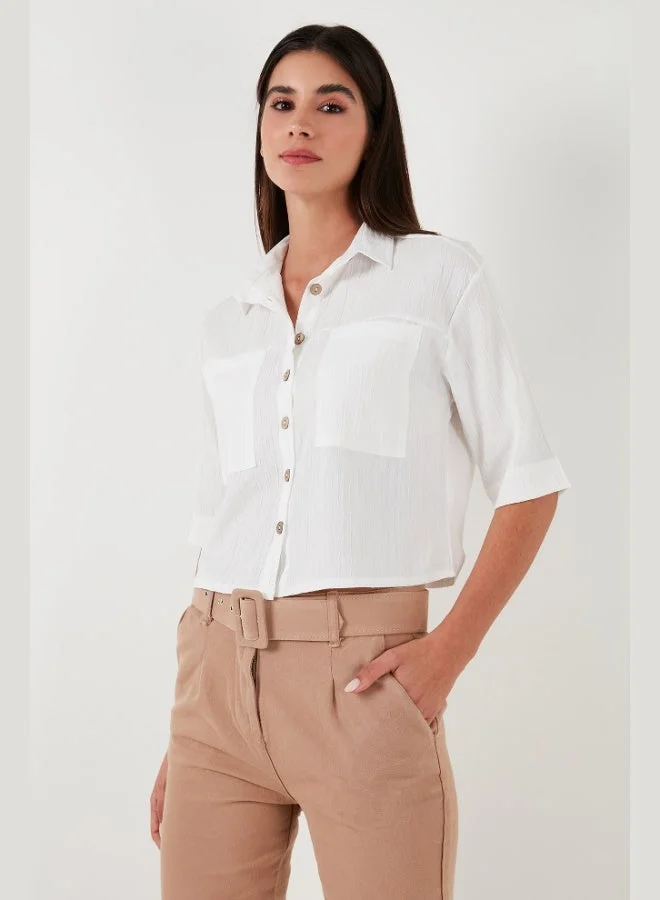 ليلا قميص نسائي بأكمام قصيرة وجيبين بقصة عادية ليلى