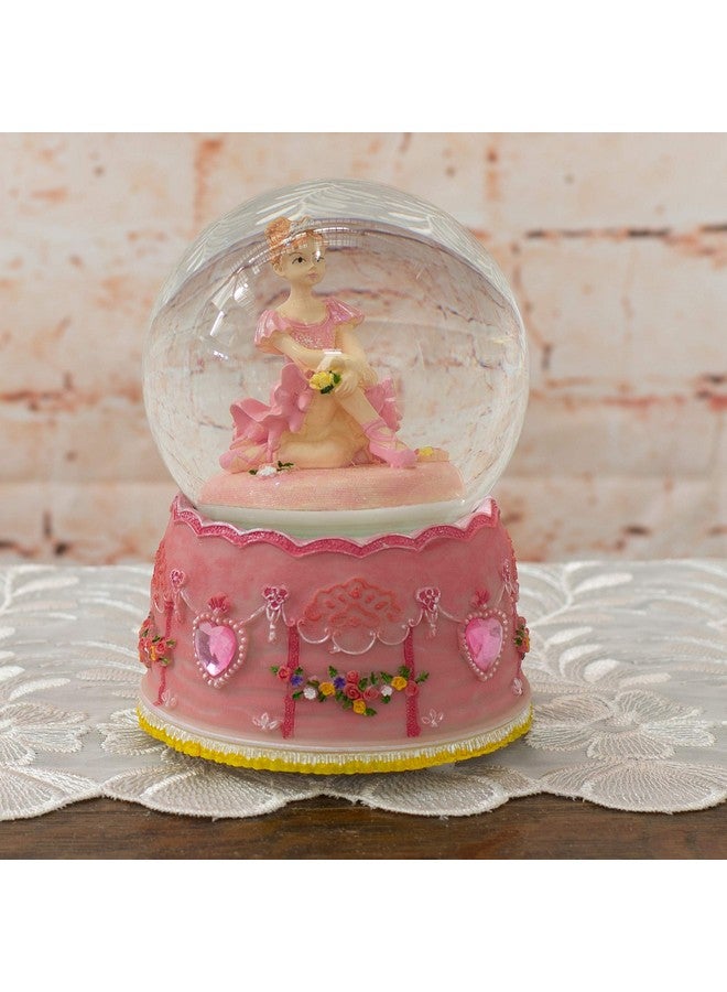 إيلانز ديزاينز تمثال راقصة باليه دوارة بوضعية الجلوس من تصميم Elanze Designs، كرة مائية بقطر 100 مم، تعزف لحن بحيرة البجع - Image 2