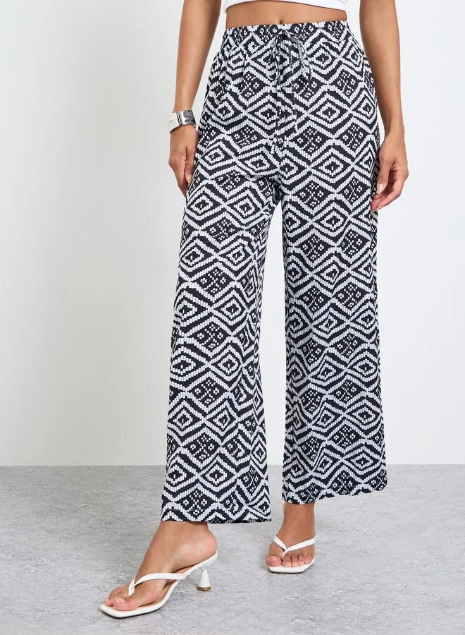 تايك تو Black All Over Print High Rise Pants