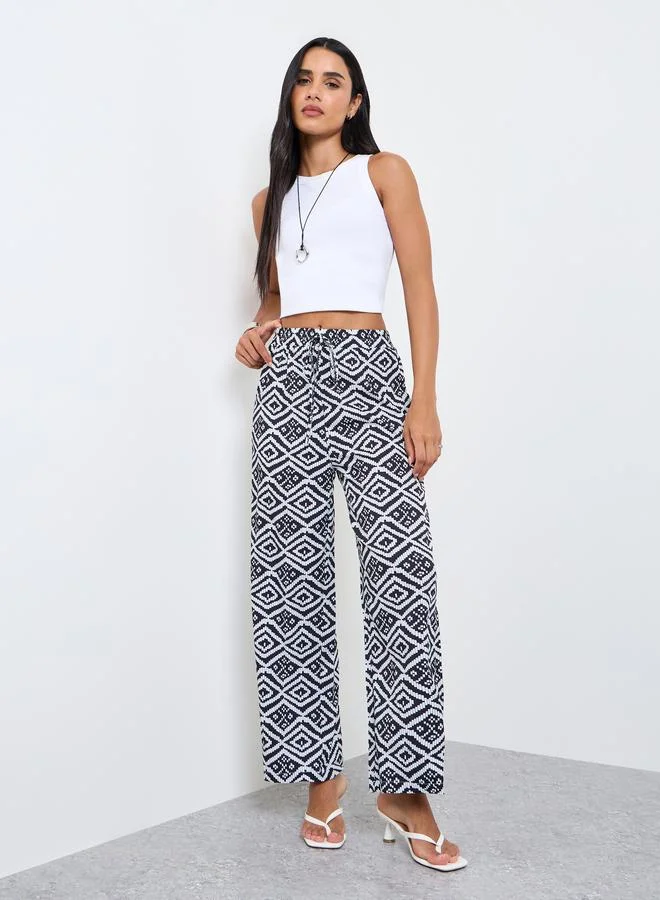 تايك تو Black All Over Print High Rise Pants