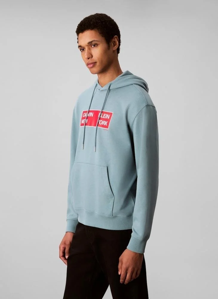 Calvin Klein Jeans Green 350 Terry Graphic Crew Neck Sweatshirt for Men | Best Price UAE