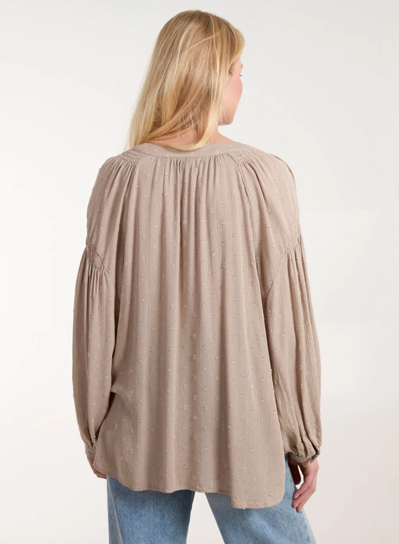 بلو فانيلا قميص بأزرار وأكمام طويلة وربطة أمامية