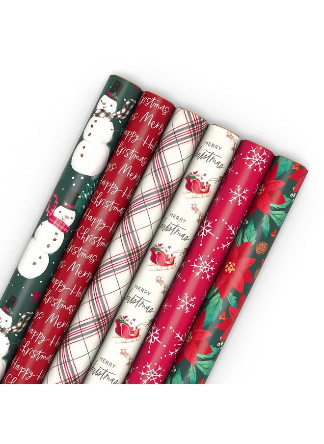 Hallmark Hallmark Rustic Recyclable Christmas Wrapping Paper (6 Rolls: 180 Sq. Ft. Total) Red, White and Hunter Green Plaid, Poinsettias, Snowflakes, "Merry Christmas," Snowman, Santa  - Image 1
