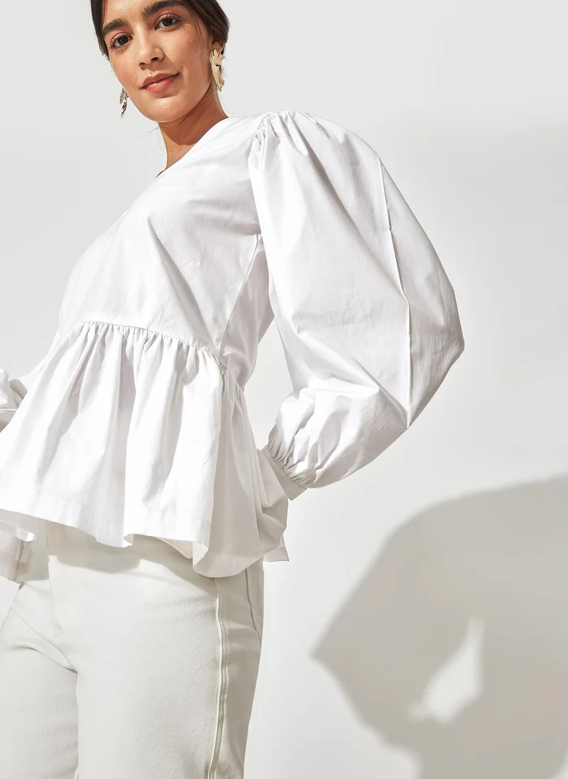 The Label Life Back Tie Peplum Top – Stylish &amp; Versatile