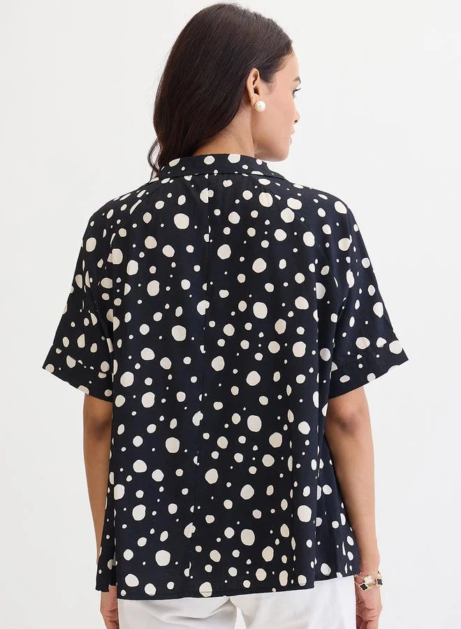 فيميلا بلوزة واسعة بطبعة نقاط سوداء