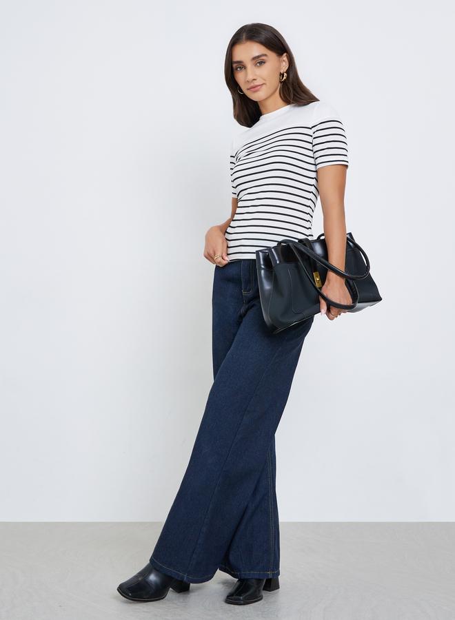 ستايلي بلوزة مخطط بياقة ضيقة وتفاصيل عقدة - Image 2