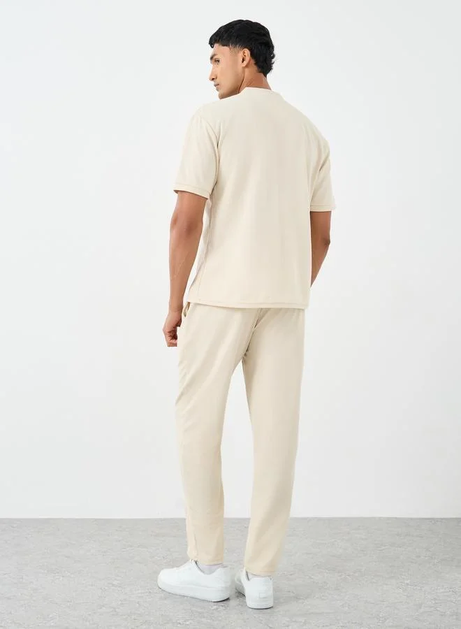 ستايلي Styli Men Solid Regular Fit T-Shirt and Joggers Co-ords