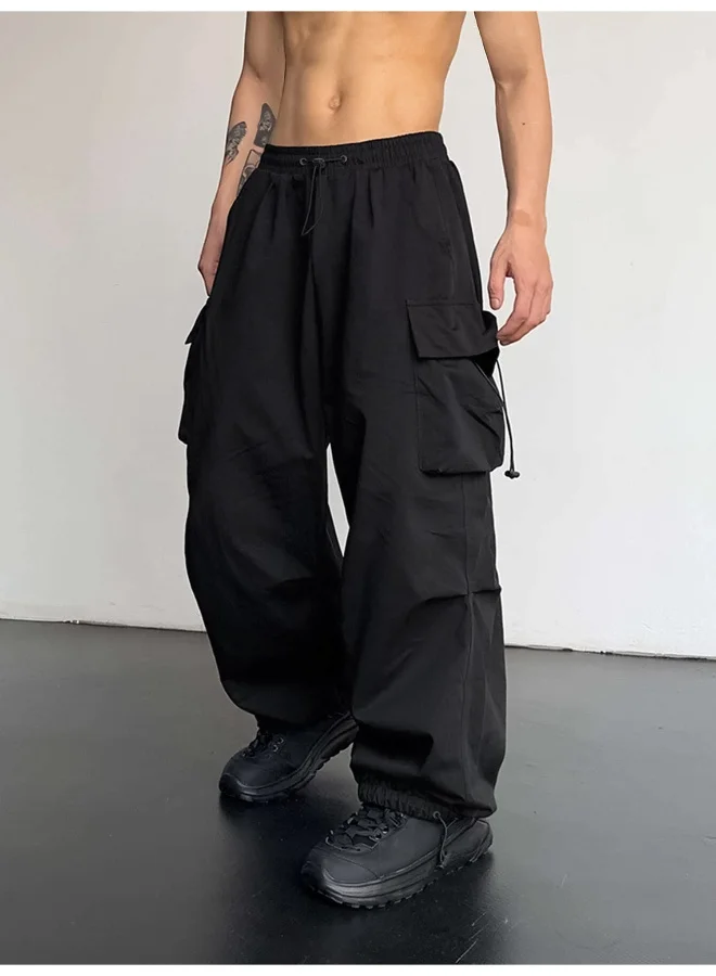 مانياك بنطلون كارجو رجالي أسود بقماش نايلون واسع بجيوب جانبية