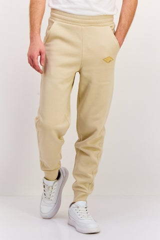 Men Regular Fit Brand Logo Jogger Pants, Cream - pzsku/Z87194E7F88F8FB0F1E64Z/45/1747056584/3bdddbd2-c0fb-4eb4-a22f-e5e401d86b8c