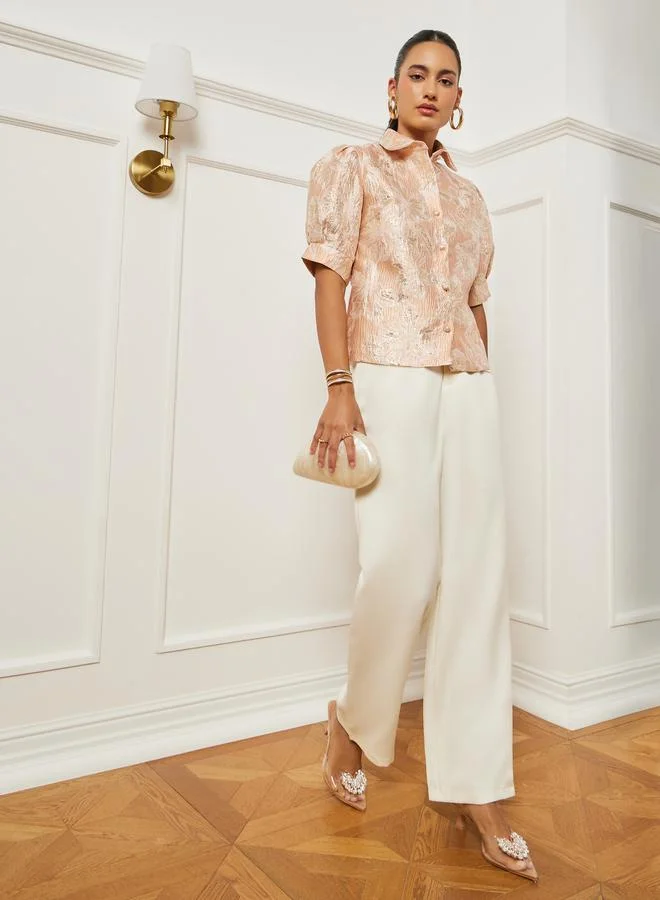 ستايلي بلوزة جاكار بنقشة الزهور وأكمام منفوخة