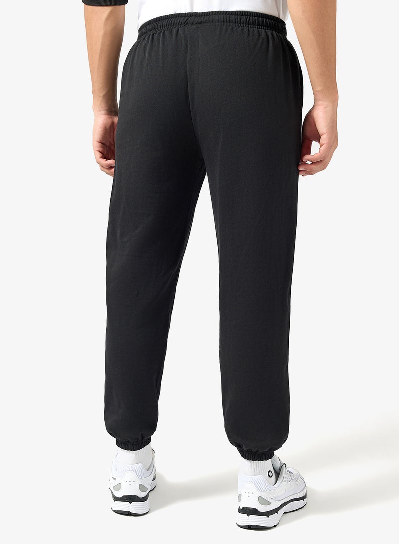 سفنتي فايف بنطلون رياضي فضفاض بتصميم جرافيك - Image 3