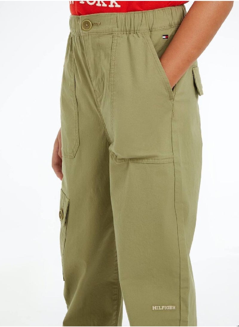 TOMMY HILFIGER - Boys' Th Monogram Wide Leg Cargo Trousers -  Stretch organic cotton, Green - Image 1