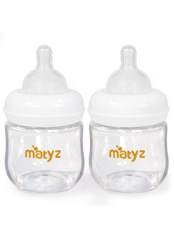Matyz 2-Pack Glass Baby Breastfeeding Bottles With Caps (White, 4Oz) - Wide Neck New Born Bottles For Baby Breastfeeding - Breastfeeding Bottles For Newborn Babies - 4 Oz Glass Baby Bottles 0-3 Months - Image 1