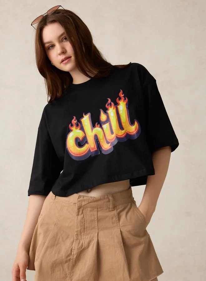 Outzidr  Black Graphic Boxy Crop T-Shirt for Women | Best Price UAE