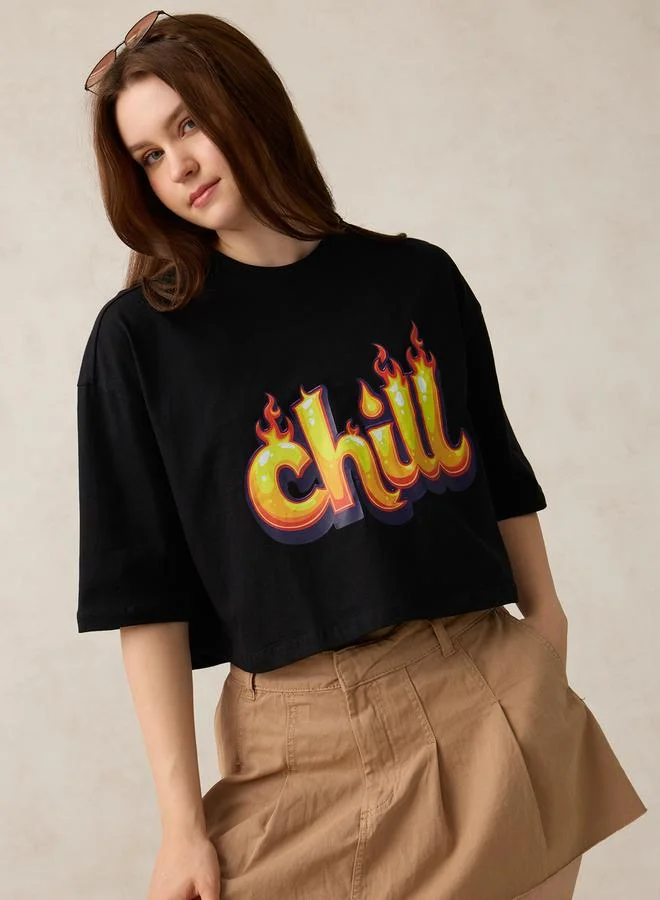 Outzidr  Black Graphic Boxy Crop T-Shirt for Women | Best Price UAE