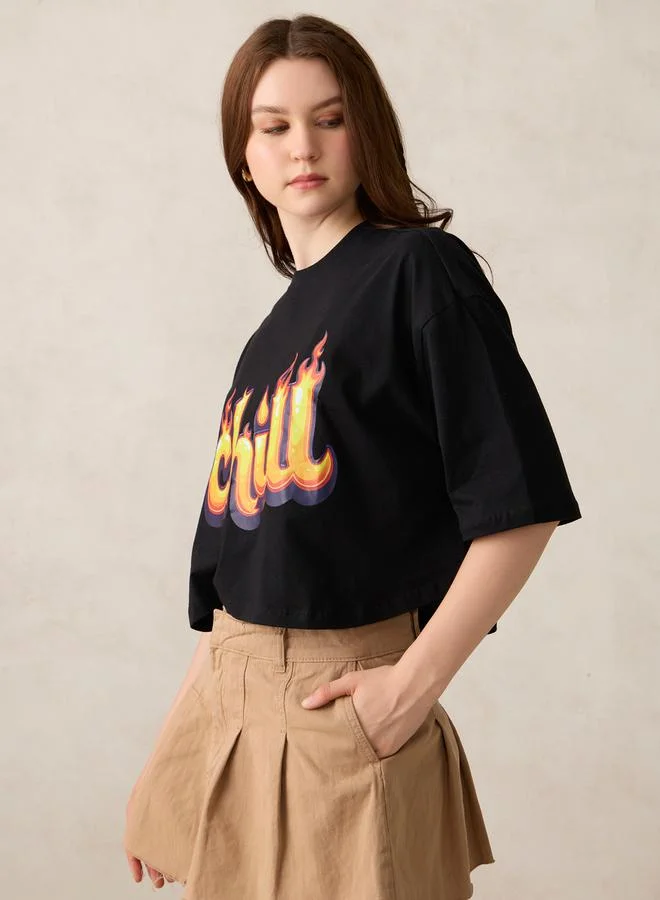Outzidr  Black Graphic Boxy Crop T-Shirt for Women | Best Price UAE