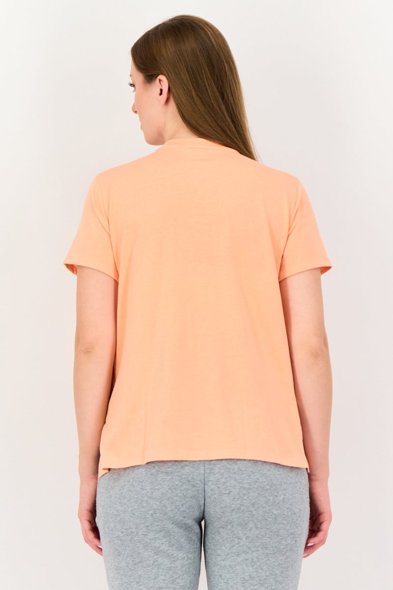 UNDER ARMOUR تي شيرت جري نسائي بأكمام قصيرة فضفاضة، كورال - Image 3