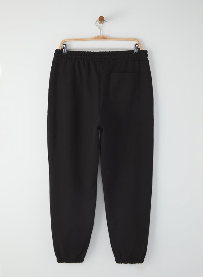 trendyol Black Oversize/Wide Cut Elastic Leg Smiley Face Printed Jogger Sweatpants - Image 5