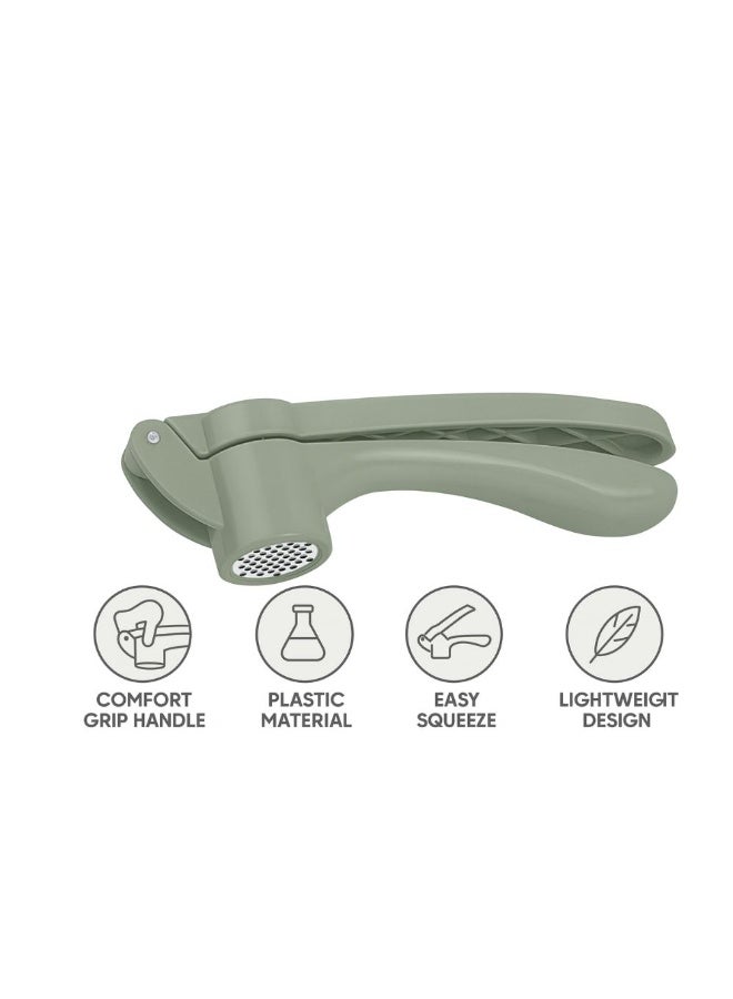 عصارة ثوم يدوية بلاستيكية بمقبض مريح، سهلة الضغط، مصممة هندسيًا للاستخدام في المطبخ، مصنوعة من بلاستيك متين وخالٍ من مادة BPA، سهلة التنظيف، أبعادها 16.5 × 3.5 × 4.5 سم، لونها أخضر. - Image 4