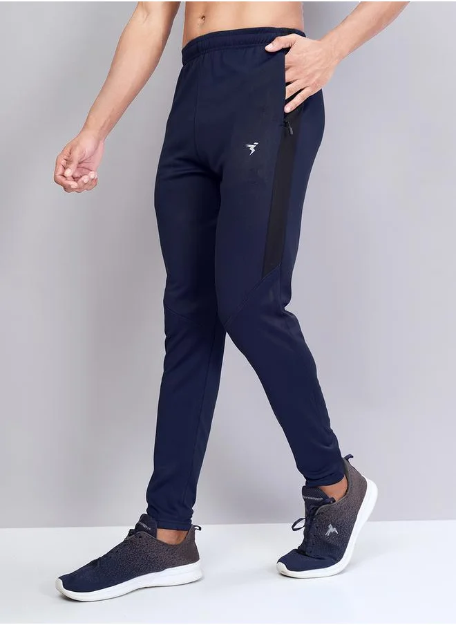 تكنوسبورت Men Solid Slim Fit Track Pants with TECHNO DRY by Styli