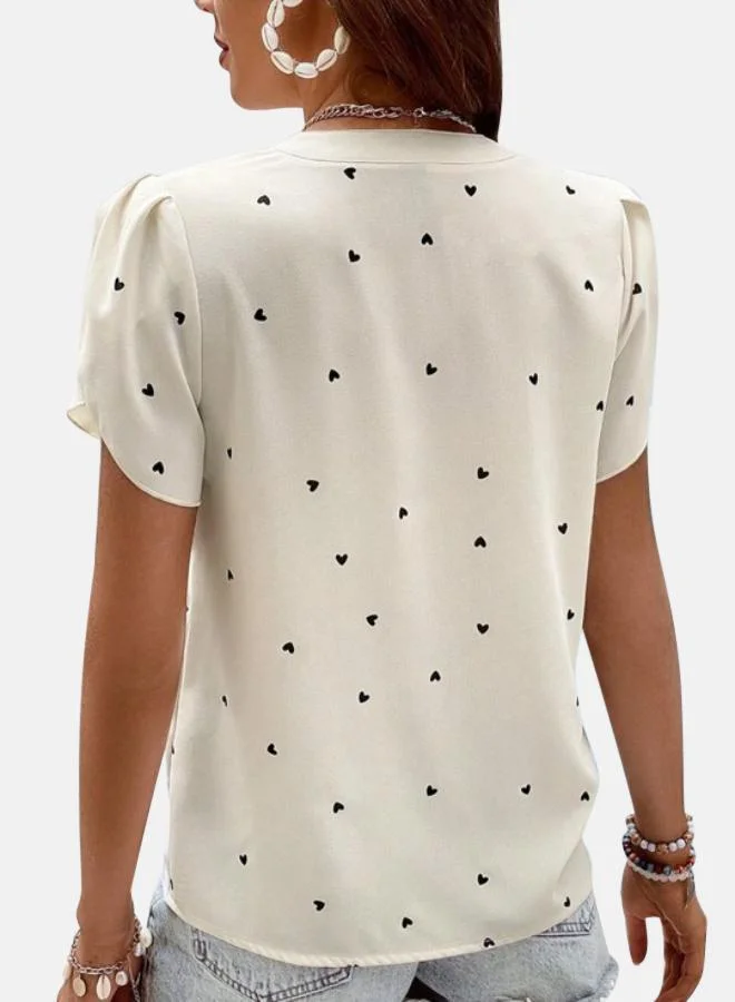 يونيكي Cream Graphic Print Top