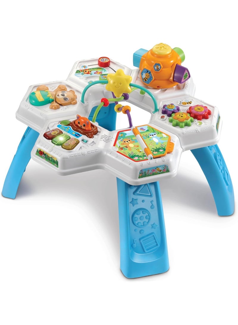 VTech Baby طاولة نشاط النحل المشغول من VTech للأطفال، لعبة تفاعلية، أغاني ولحن، تنمية المهارات الحركية، تطوير الحواس، السبب والنتيجة، مناسبة للأعمار من 6، 9، 12 شهرًا فما فوق، النسخة الإنجليزية - Image 1