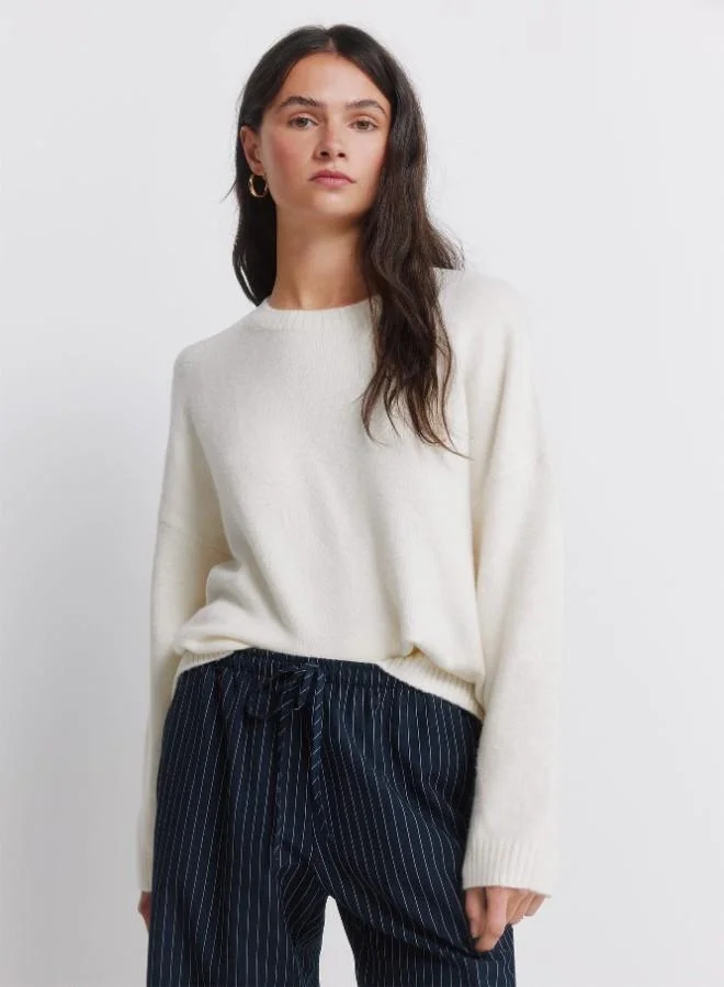 Springfield  Mid-rise trousers with side pockets and two fake back welt pockets, with an elasticated drawstring waistband and straight leg. for Women | Best Price UAE