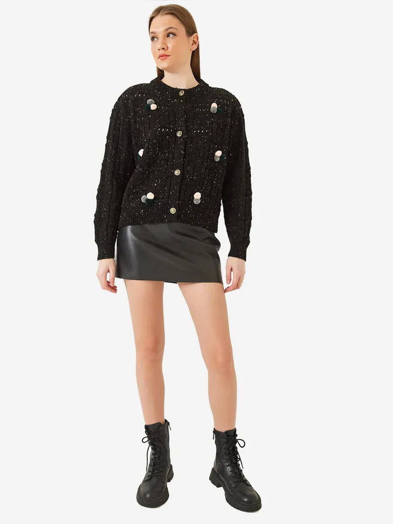 بيانكو لوتشي كارديجان لوكسي محبوك بنقوش مع بوم بوم