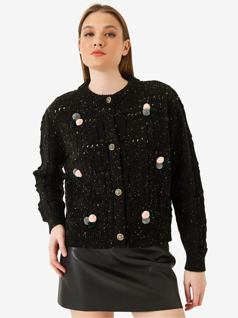 بيانكو لوتشي كارديجان لوكسي محبوك بنقوش مع بوم بوم